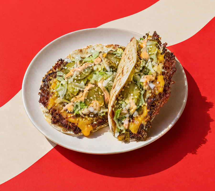 Two smash tacos on a plate